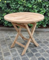 Foldable round teak table